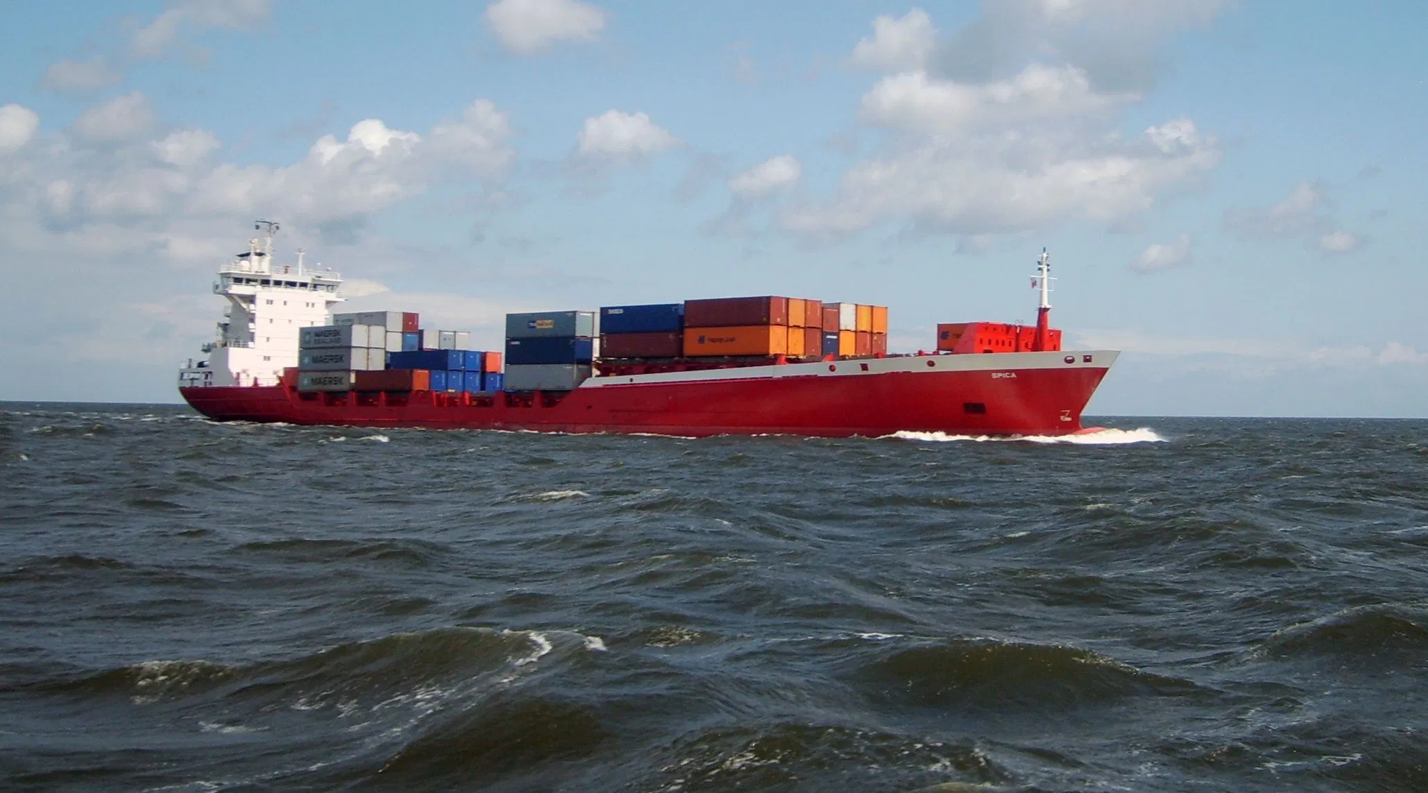 Container Ship – Freighter. Photog of the cargo ship in the Baltic Sea in Poland.